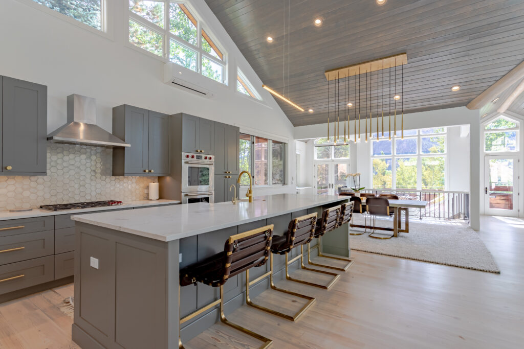 Luxury Aspen kitchen stocked with groceries and fresh flowers